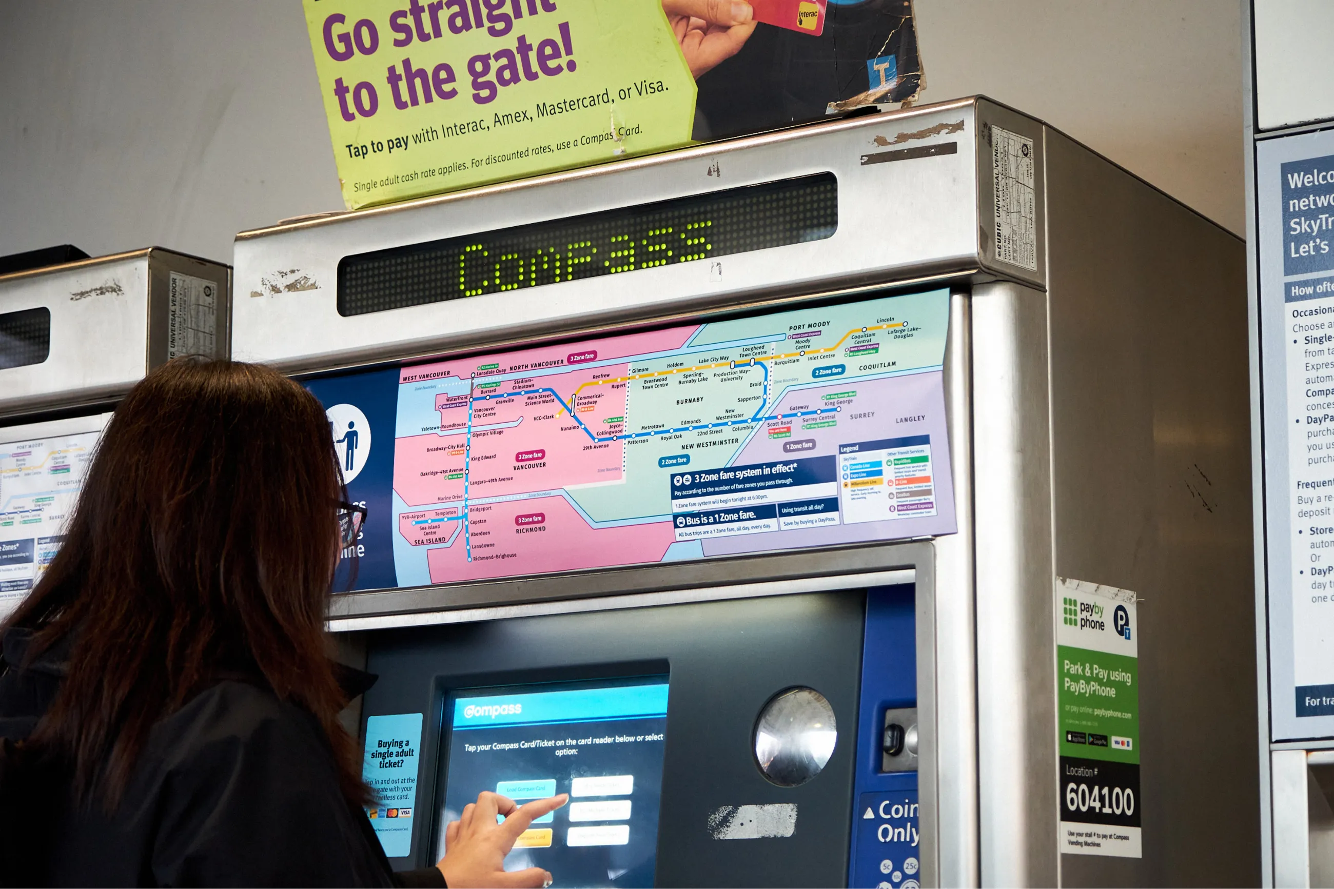 Proposed TransLink fare map taped over existing map on fare machine